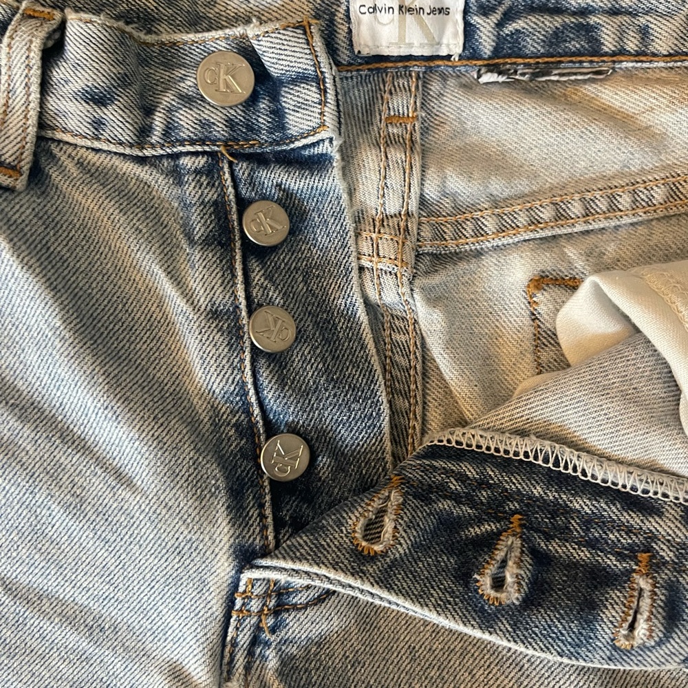 Vintage Calvin Klein button fly frayed jeans